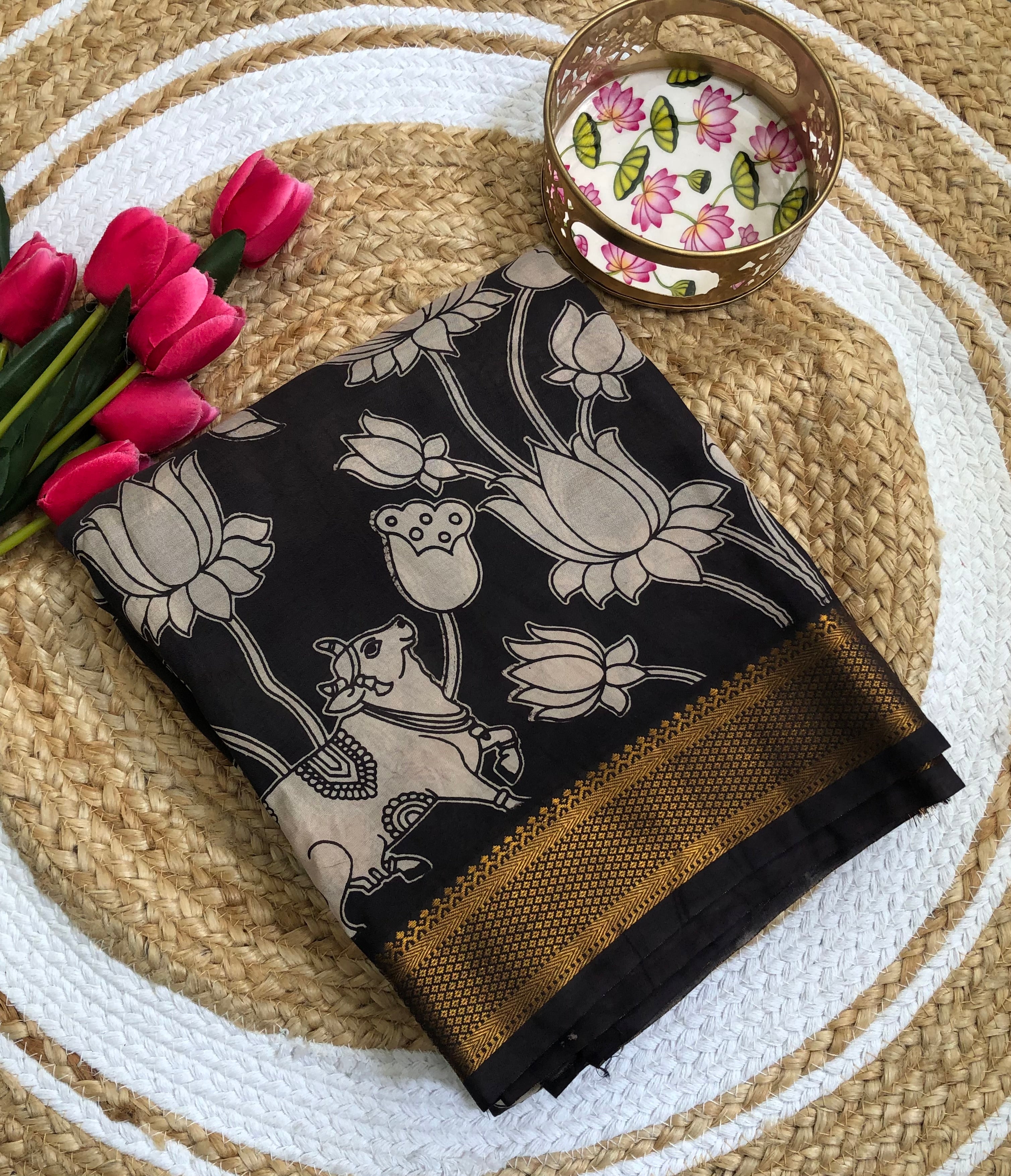 Tarathi off white Black lotus print kalamkari saree with Nizam Border