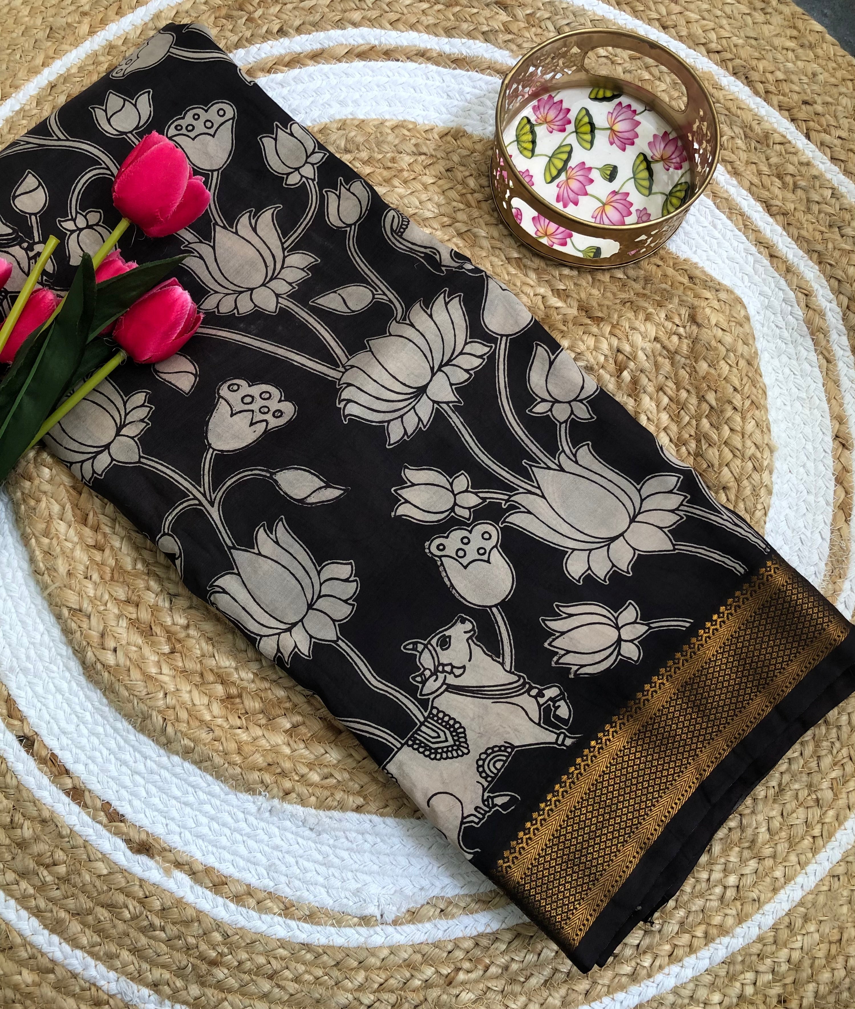Tarathi off white Black lotus print kalamkari saree with Nizam Border