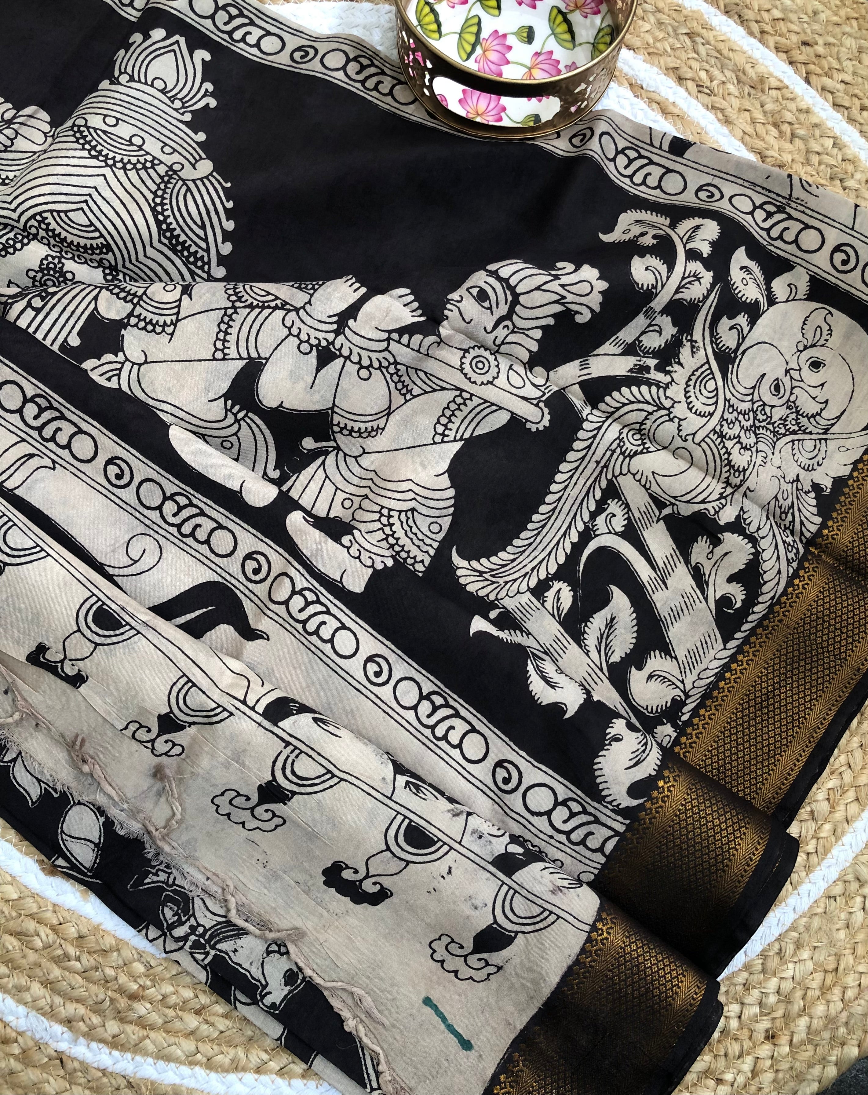 Tarathi off white Black lotus print kalamkari saree with Nizam Border