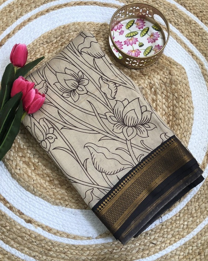 Tarathi cream colour lotus kalamkari saree with Nizam Border