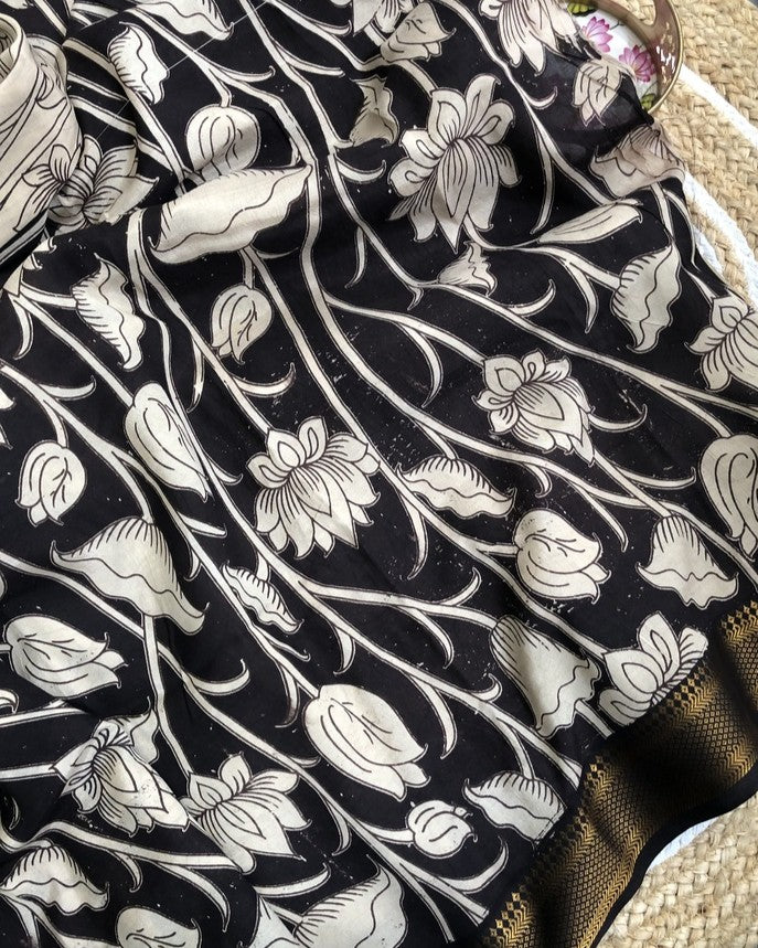 Tarathi cream colour lotus kalamkari saree with Nizam Border