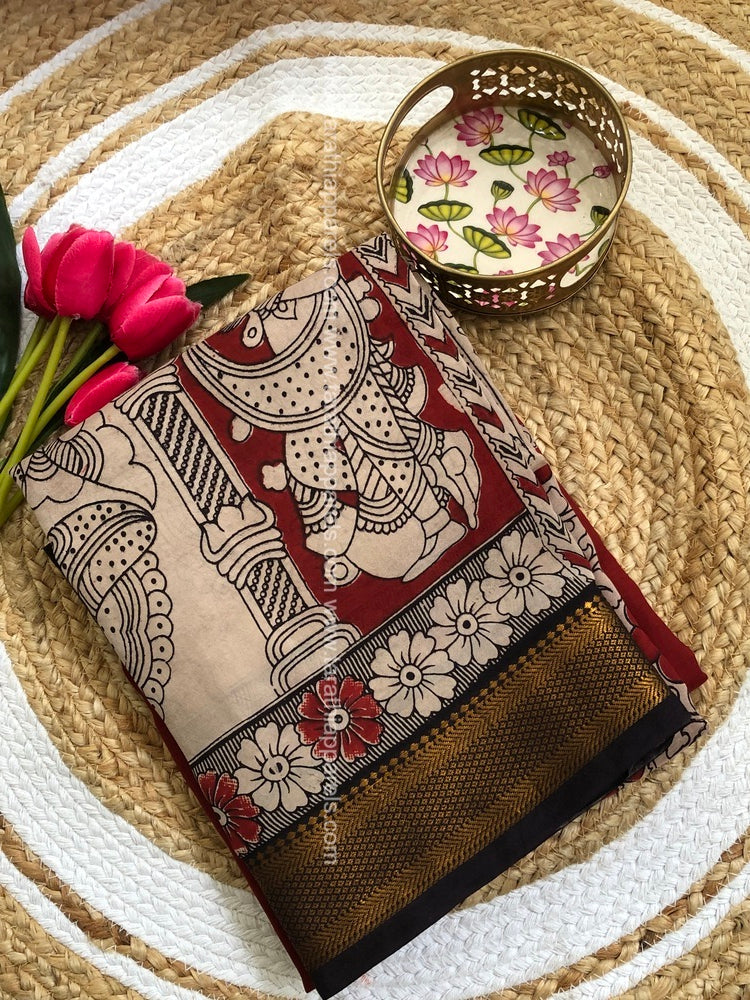 Tarathi  Red kalamkari saree with Nizam Border